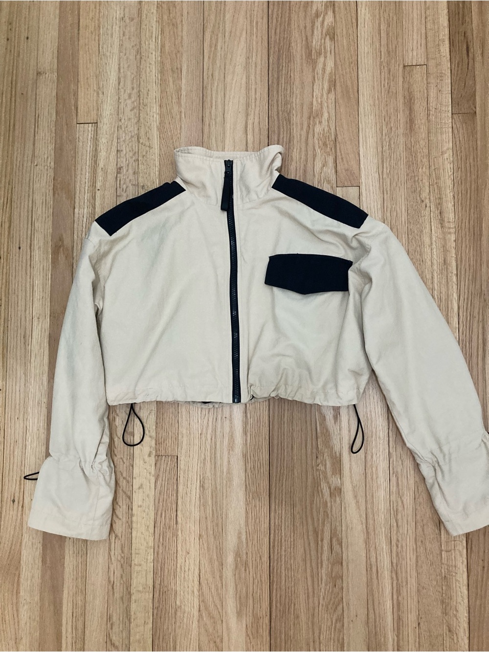 Pilcro Cream Cropped Utility Jacket with Black Shoulder and Pocket Accents